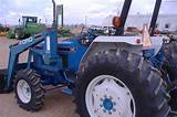 Pictures of New Holland 7309 Loader