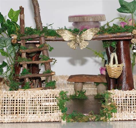 The kettle fairy garden ~ 2013. Garden Fairy Butterfly Lodge | Fairy garden, Fairy garden ...