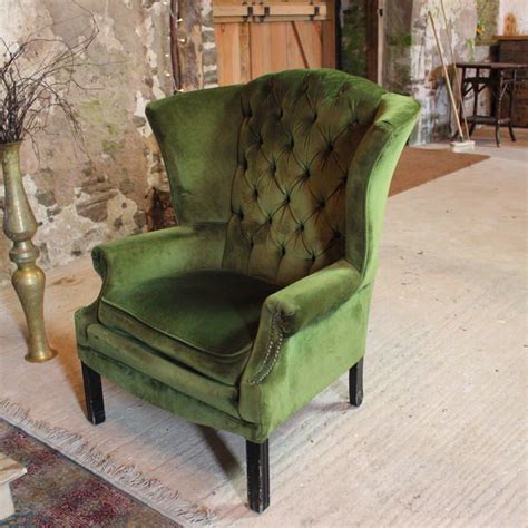 Imagine it in a lounge room by the fireplace. Green Chesterfield Wingback Chair with mildly worn arms ...