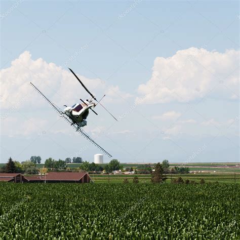 Helicopter Spraying Crops With Pesticide Stock Photo By ©rcarner 11947687