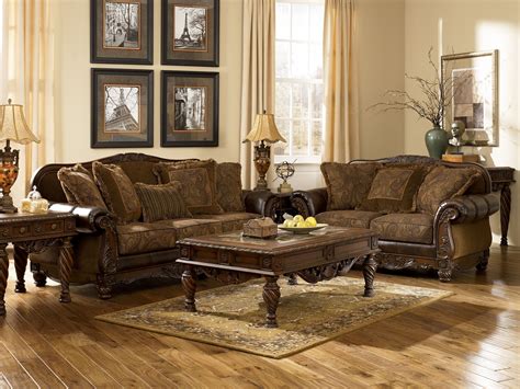 Generally, though, real leather will cost more than its synthetic i have had both a traditional living room set with a love seat and sofa and a living room with a sectional and an ottoman and i can honestly say. Ashley Leather Living Room Furniture Sets - DECOREDO