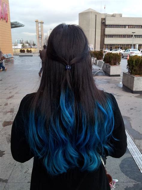With all of the rainbow hues that continue to be the trendiest choices in hair color, blue black hair lands on the darkest end of the spectrum. blue ends #hair | Dip dye hair