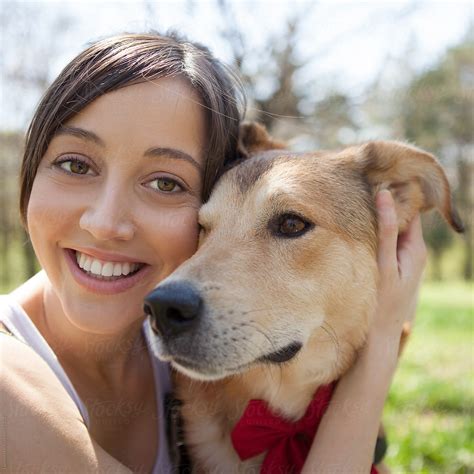 Woman Hugging Her Dog By Stocksy Contributor Lumina Stocksy