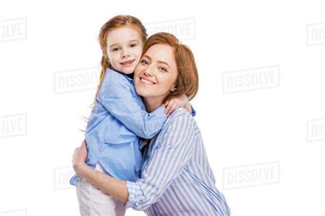 Beautiful Happy Mother And Daughter Hugging And Smiling At Camera