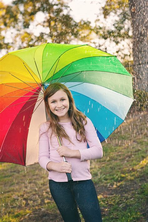 Girl With Rainbow Umbrella Del Colaborador De Stocksy Gillian Vann
