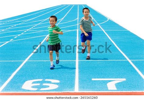Boy Running On Racetrack Stadium Stock Photo 265161260 Shutterstock