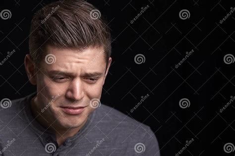 Portrait Of Crying Young White Man Looking Down Stock Photo Image Of