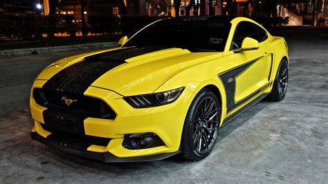 Black Stripes Revealing The WildNature Of Yellow Ford Mustang 5 0