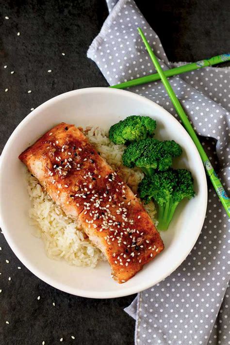 Season with salt, pepper and paprika (or cajun seasonin and transfer to the oven. Oven Baked Salmon with Honey Ginger Glaze | Lemon Blossoms