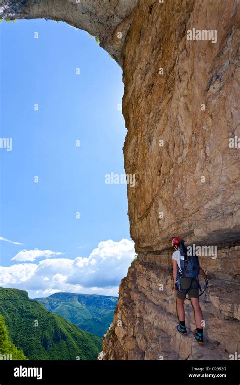Climber On The Gerardo Sega Fixed Rope Route On Monte Baldo Above Avio