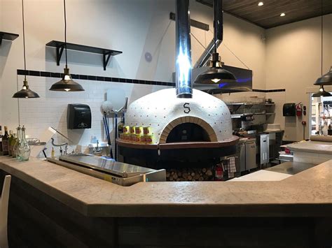 Open Kitchen Concept Featuring A Custom Tiled Modena140 Pizza Oven