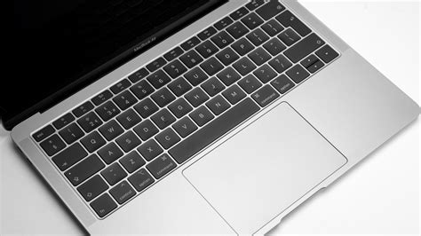 Apple Agrees To 50 Million Settlement Over Macbooks Old Defective