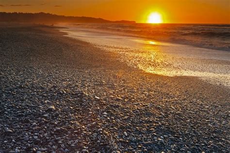 Yellow Sunset Gillespies Beach South Island Nz Photo Information