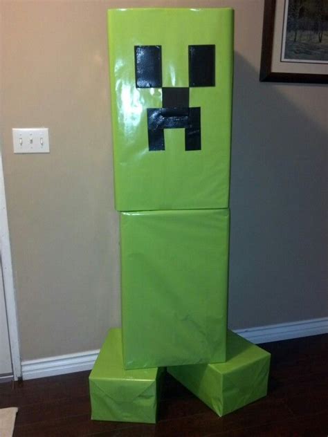 A Green Creeper Costume Made Out Of Paper