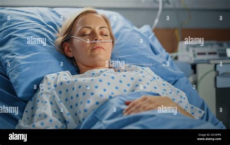 Hospital Ward Portrait Of Beautiful Young Woman Sleeping In Bed Fully