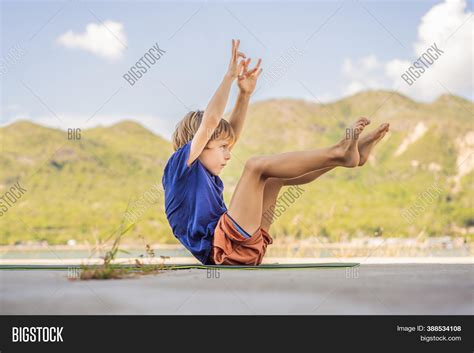Boy Doing Yoga On Yoga Image And Photo Free Trial Bigstock