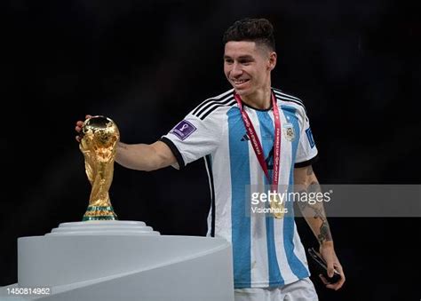 Gonzalo Montiel Of Argentina Touches The World Cup Trophy During The