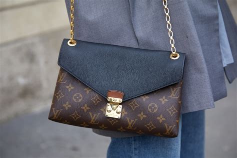 Press enter to open menu items. The designer of the Louis Vuitton bags died on this day