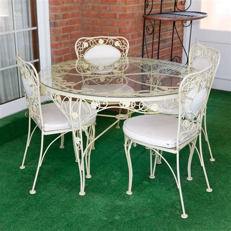 Birmingham Ornamental Wrought Iron Patio Dining Table And Chair Set Ebth