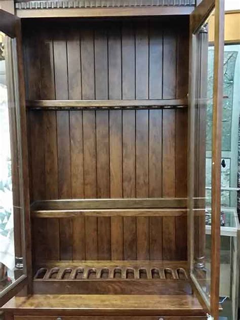 Our gun cabinets are affordable and can be designed, as a corner cabinet, wall cabinets or custom built in a wall unit just like our kitchen cabinets and entertainment centers. Amish Custom Gun Cabinet with Safe - Amish Custom Gun Cabinets