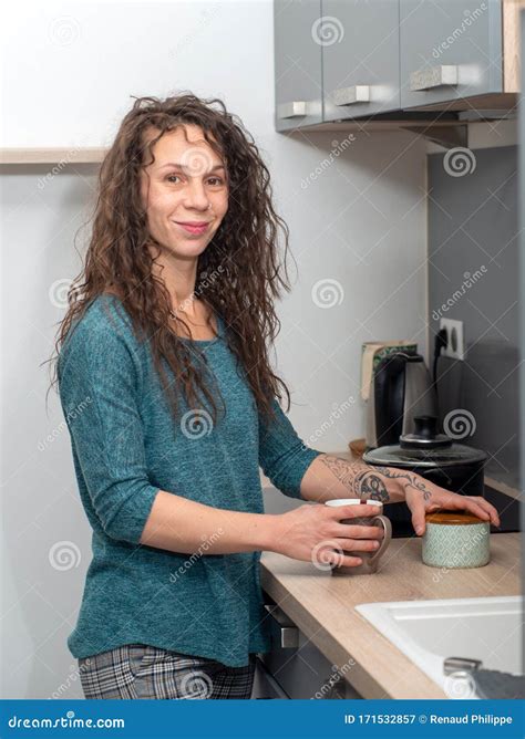 Young Woman With Long Hair Is In The Kitchen Stock Image Image Of
