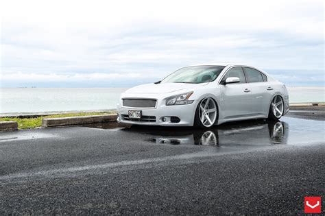 Tuning Kit On Silver Nissan Maxima Featuring Chrome Elements — Carid