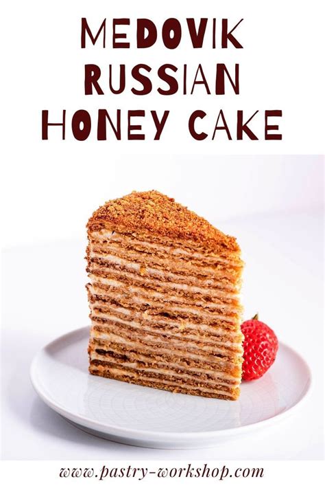 a stack of pancakes on a plate with the words medovik russian honey cake
