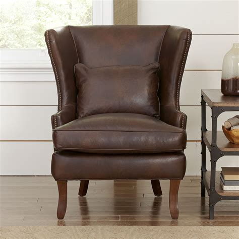 Constructed of rubber wood and faux leather upholstery, it's available in devore gray. Birch Lane™ Solomon Leather Wingback Chair & Reviews | Wayfair