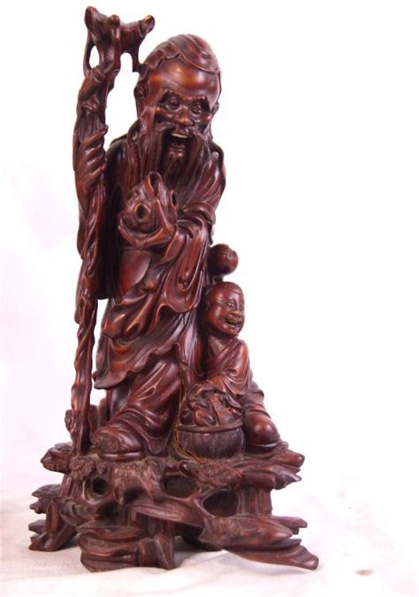 Three Chinese Immortal Wood Carved Statues