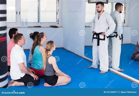 Karate Coach Teaching Adults Stock Image Image Of Demonstrating Explaining 231342917