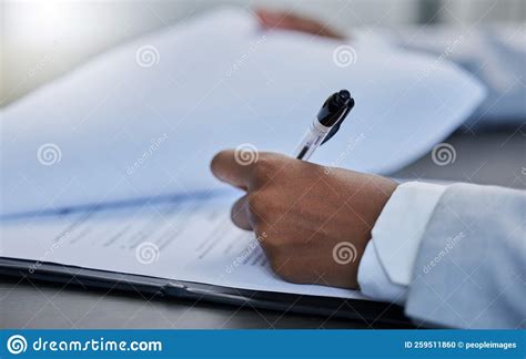 Read The Fine Print S Businessman Filling Out Paperwork In His Office