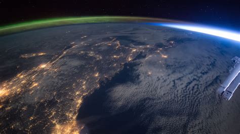Planet Earth Seen From The International Space Station With Aurora