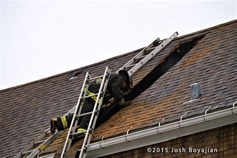 Firefighter On Roof Ventilating Firescenesnet