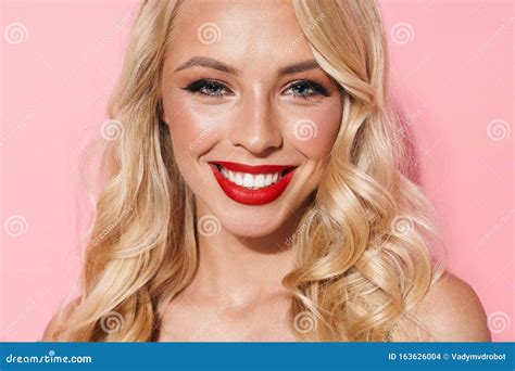 Image Closeup Of Beautiful Seductive Woman Wearing Red Lipstick Smiling And Looking At Camera