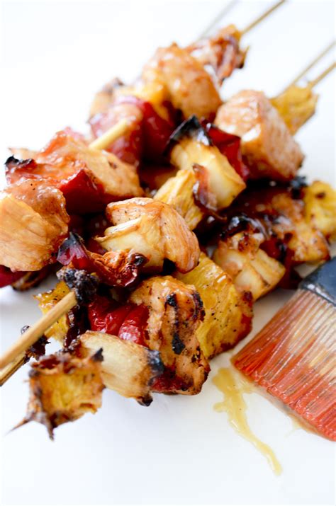 Prepare the kabobs by threading the chicken, pineapple, tomatoes and pepper onto the wooden skewers. Bacon, Pineapple, Chicken Kabobs - Recipe Diaries