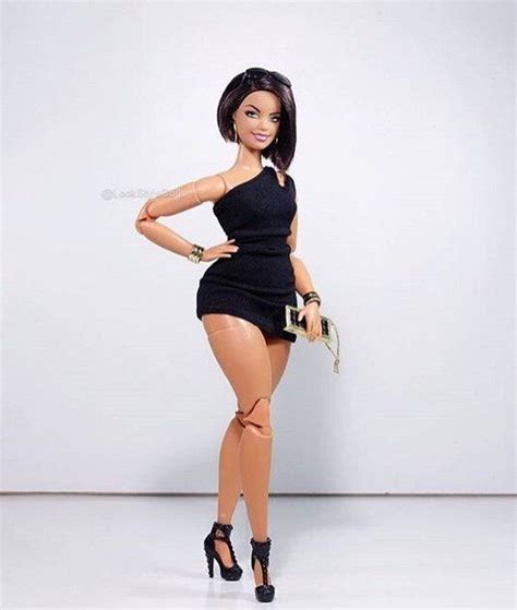 funny a head from a regular barbie put on a curvy barbie doll body probably the hot pink hair