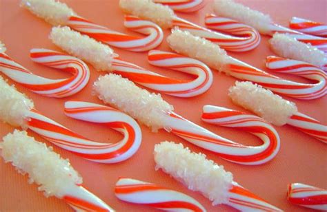 Candy Canes Dipped In White Chocolate And Covered With Sprinkles