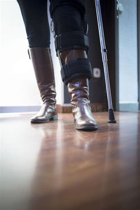 Lady Walking On Crutches In Hospital Clinic Stock Image Image Of