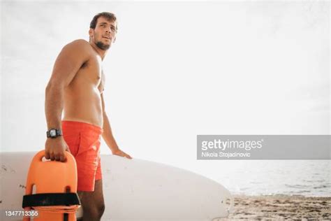 Lifeguard Running Male Photos And Premium High Res Pictures Getty Images