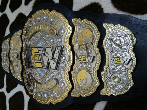 The official athletics website for ecac AEW World Heavyweight Championship Belt | AEW Championship Belt
