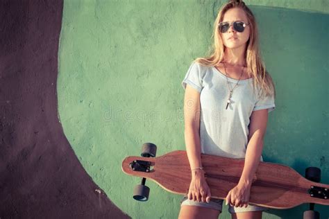 Fashion Lifestyle Beautiful Young Blonde Woman With Skateboard Stock