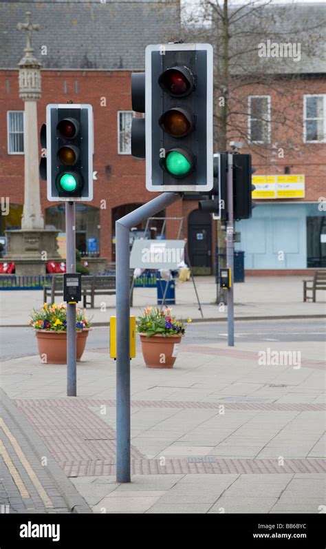 Green Traffic Lights At A Pedestrian Crossing In A Town In England