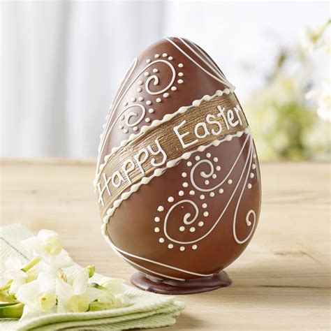 Milk Chocolate Happy Easter Egg £1495 A Swiss Milk Chocolate Egg Hand Piped In White