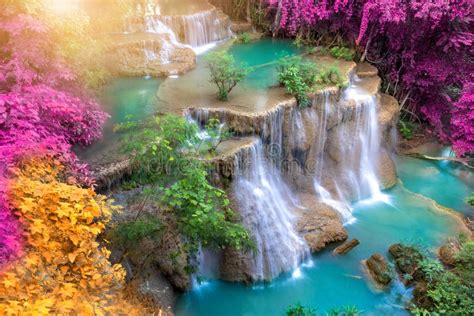 A Colorful Waterfall The Waterfall Has Bright Green Colors Stock Image