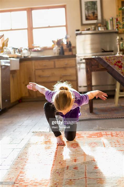 Caucasian Girl Dancing In Kitchen Photo Getty Images
