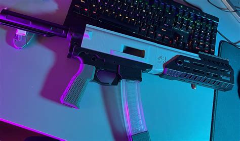 Upgrade the look of your FGC-9 MK2 with the KJAS barrel retainer/hand