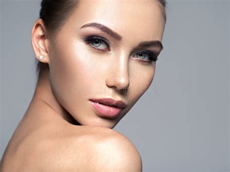Closeup Face Of Beautiful Young Woman With Healthy Skin Stock Image