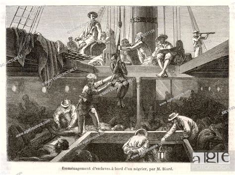 Slaves Being Lowered Into The Hold Of A Slave Ship Stock Photo