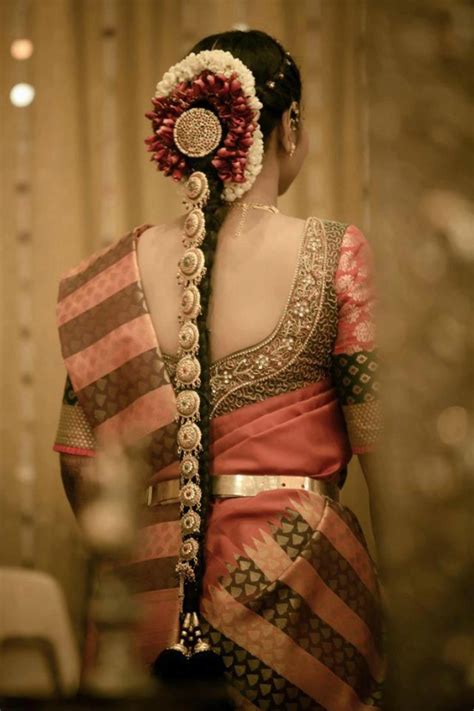 If you are planning to wear a pattu saree to a wedding or event then make sure to put it proper thought and effort into the blouse pattern as it can totally take your look notches up helping you stand out in the crowd. 20 Beautiful Pics of Pattu Saree Blouse Back Neck Designs ...