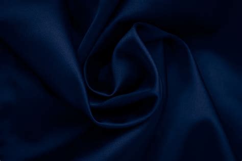 Premium Photo Dark Blue Wavy Silk Background Abstract Surface Of Fabric Textile Of Cloth